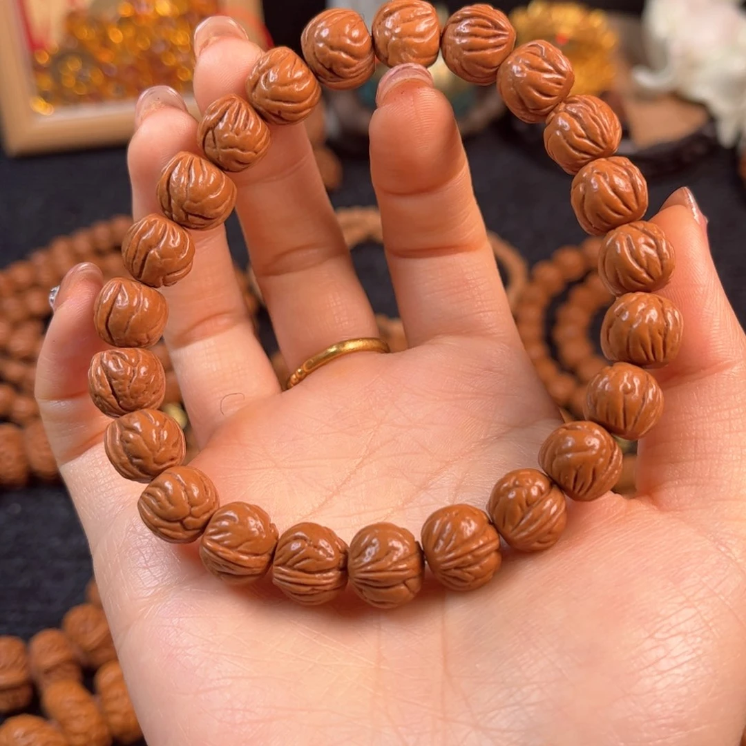 桃核手串锦**际A2链接手串