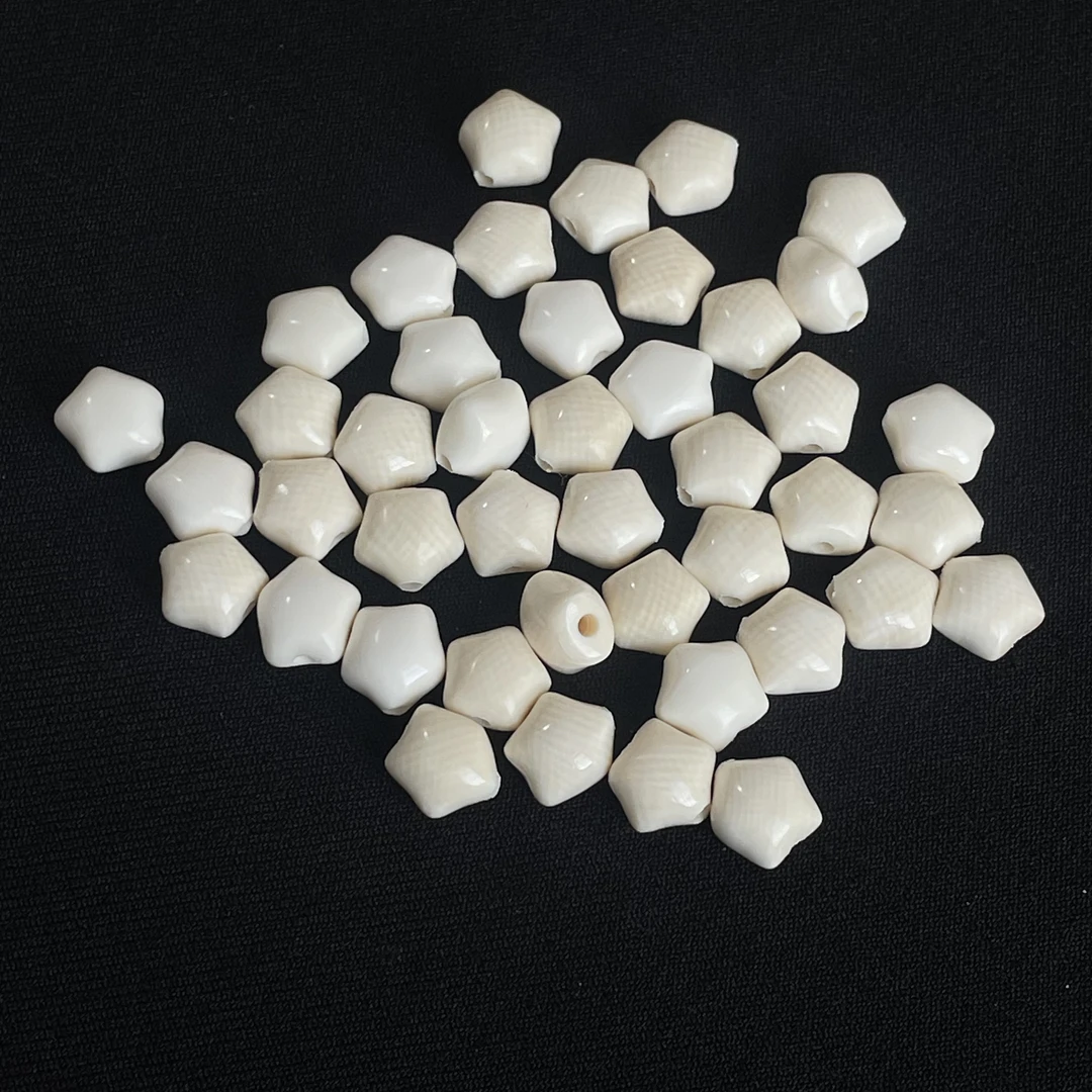 PD072 星星约珠径9*厚度7mm只做天然猛犸牙