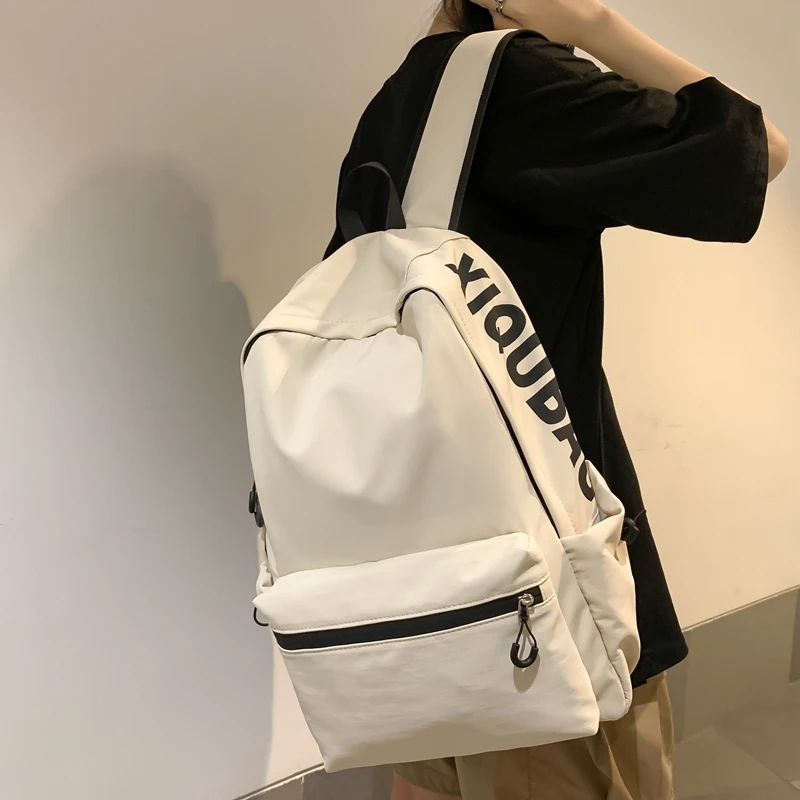 轻便纯色双肩包女韩版少女百搭书包女大容量初中生大学生电脑背包