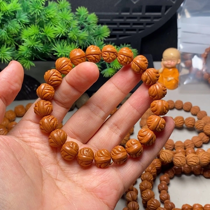 桃核手串F*特价凤羽手串