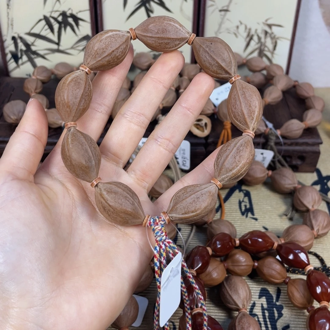 胡***卜手串橄榄核梅林铁核1929