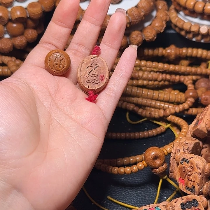 用***9桃核手串2个桃核福牌