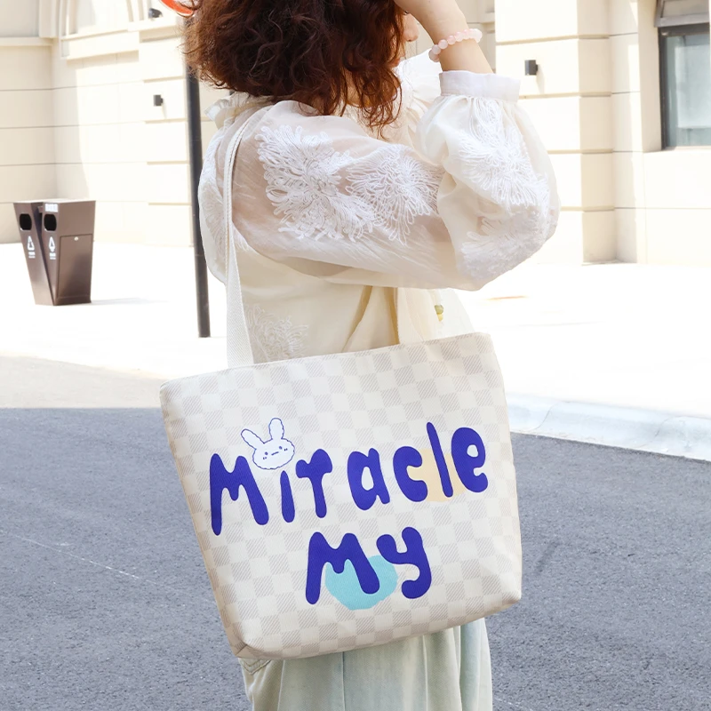 2024时尚夏季百搭可爱蓝色英文学生上课包网红大容量单肩帆布包女