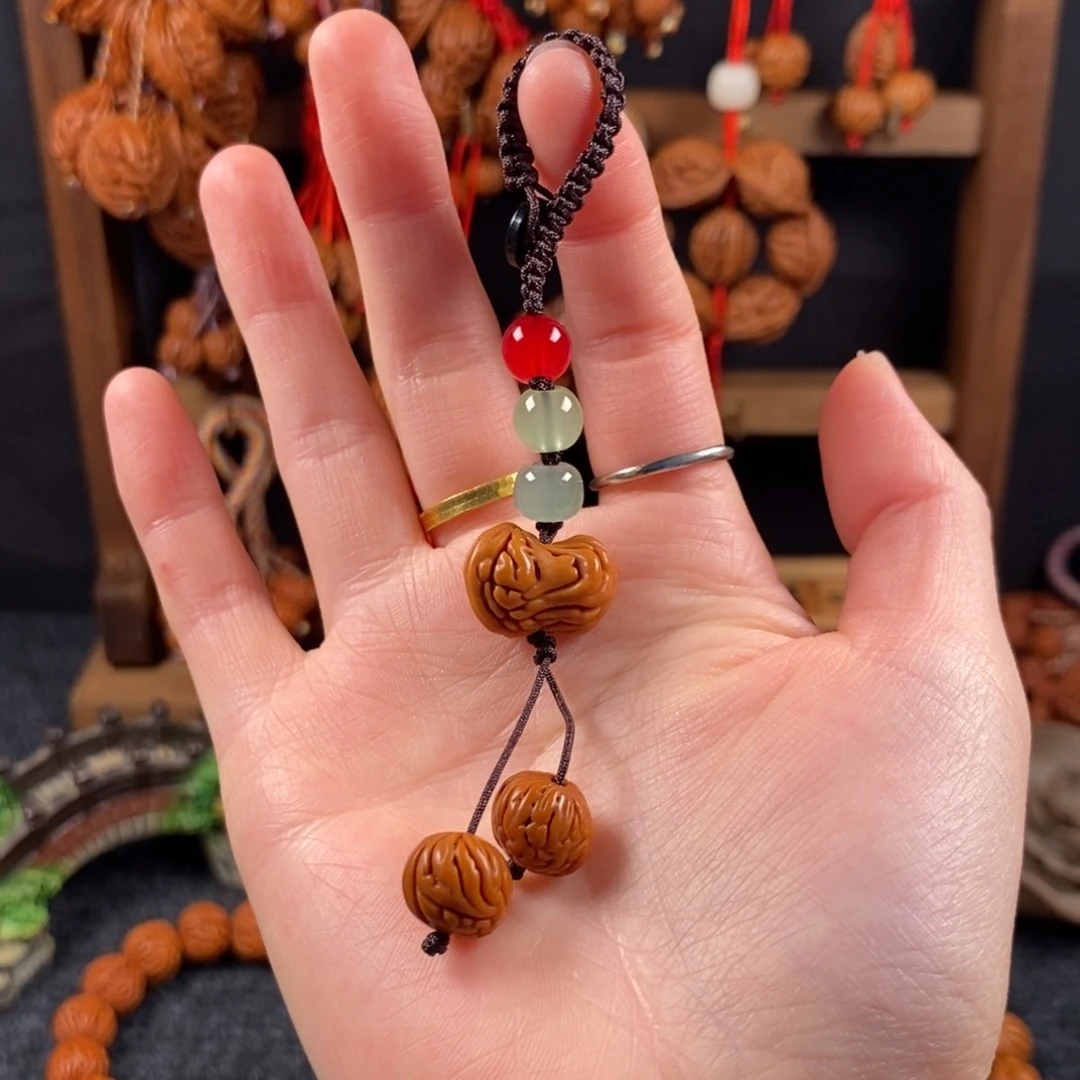 吊坠桃核桃枭手串