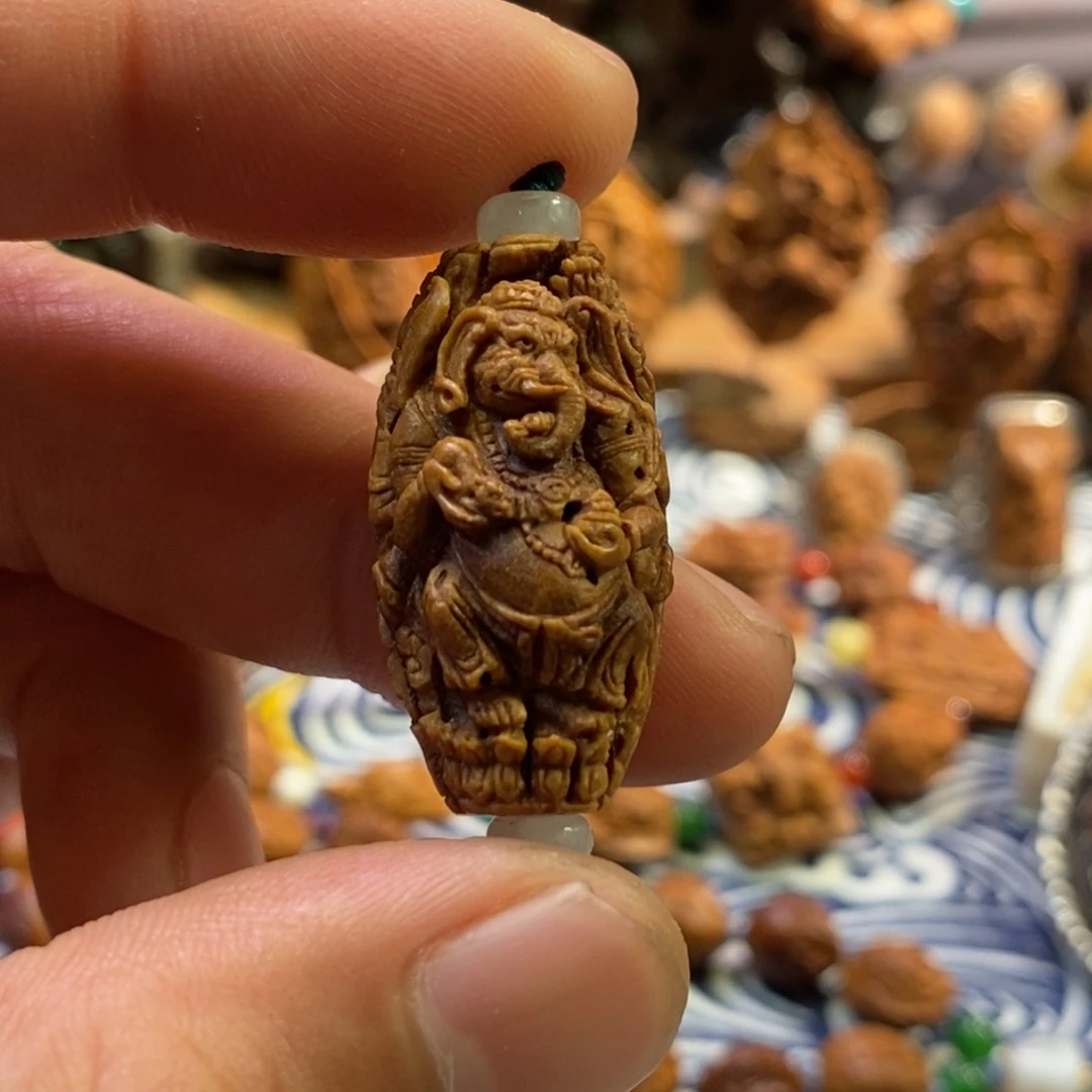 潍坊核雕桃核雕刻象神