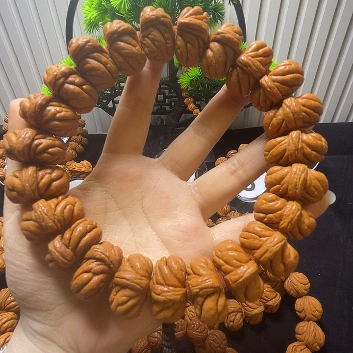木质类陕西秦岭龙纹桃核手持