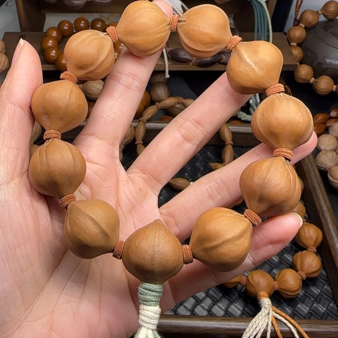 手串橄榄核01。2.25*2.5三花