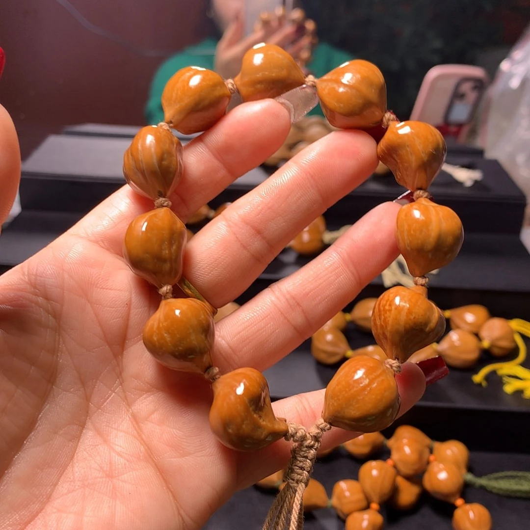 橄榄核手串/手链一****?三花手串