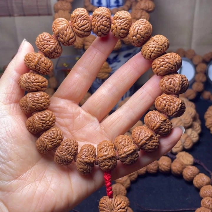 渡***虚桃核吊坠秦岭桃核手持五爪金龙