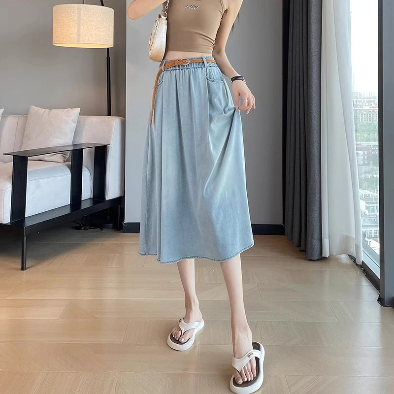 天丝牛仔半身裙女夏季薄款2025新款a字遮胯梨形身材冰丝中长裙子
