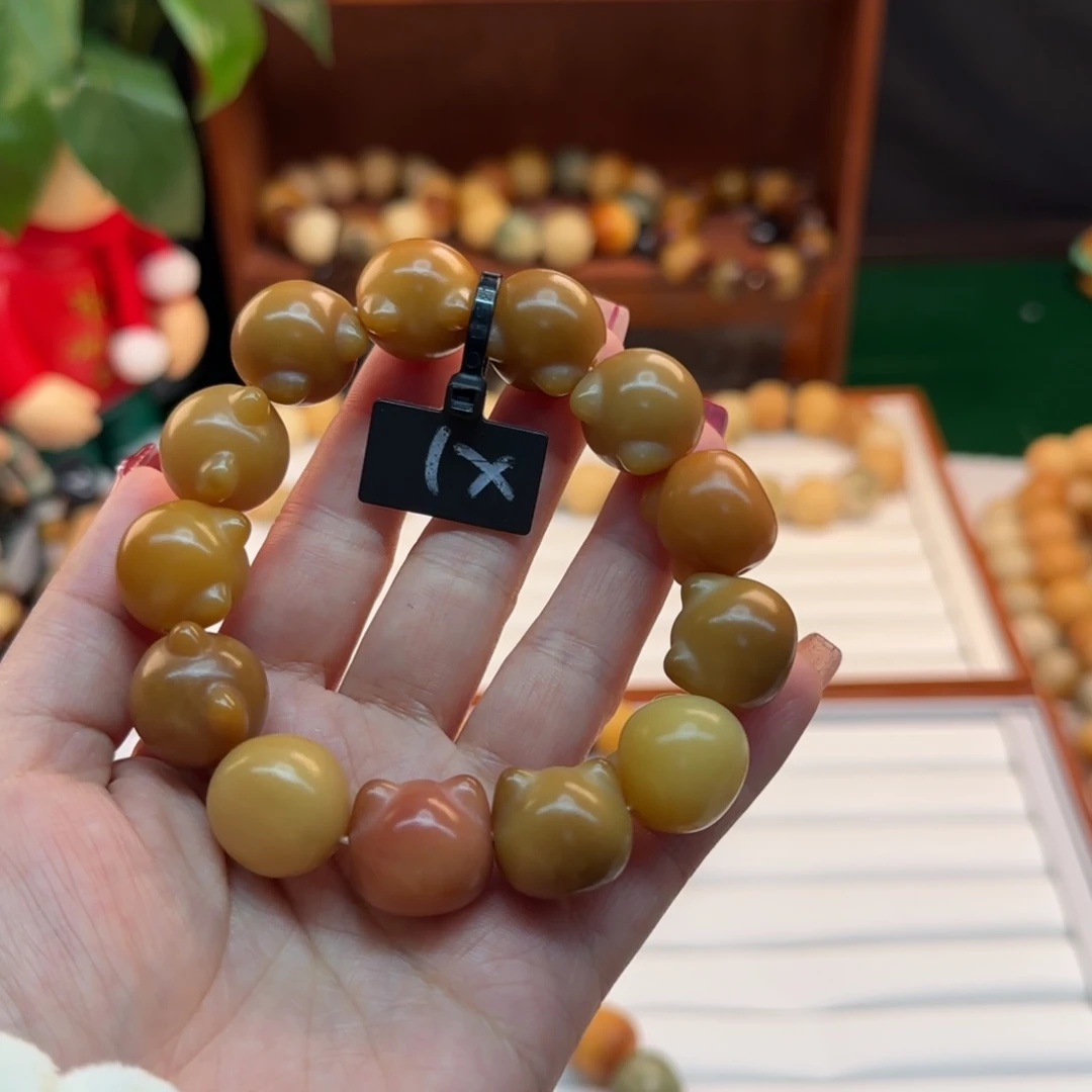 菩提根/象牙果手串何**?卡18猫头干磨瑕疵