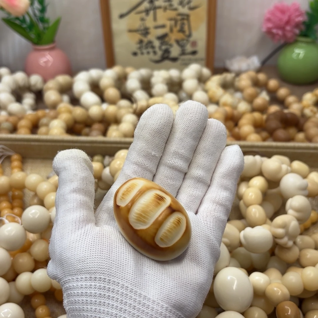 吊坠菩提根/象牙果牙果面包把件022