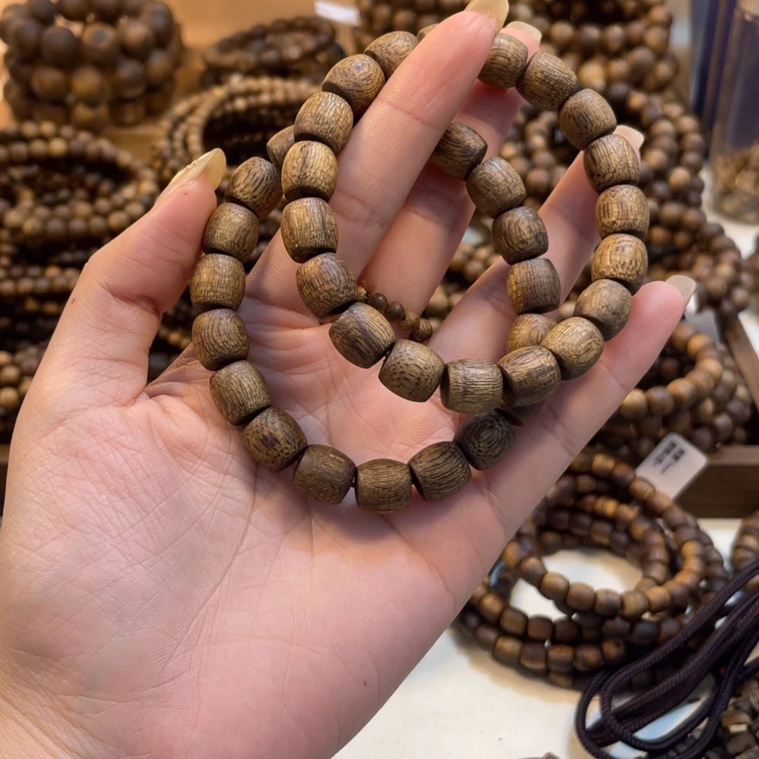 蔡***生沉香沉香碎屑卡1.0单圈鼓珠老料两条14