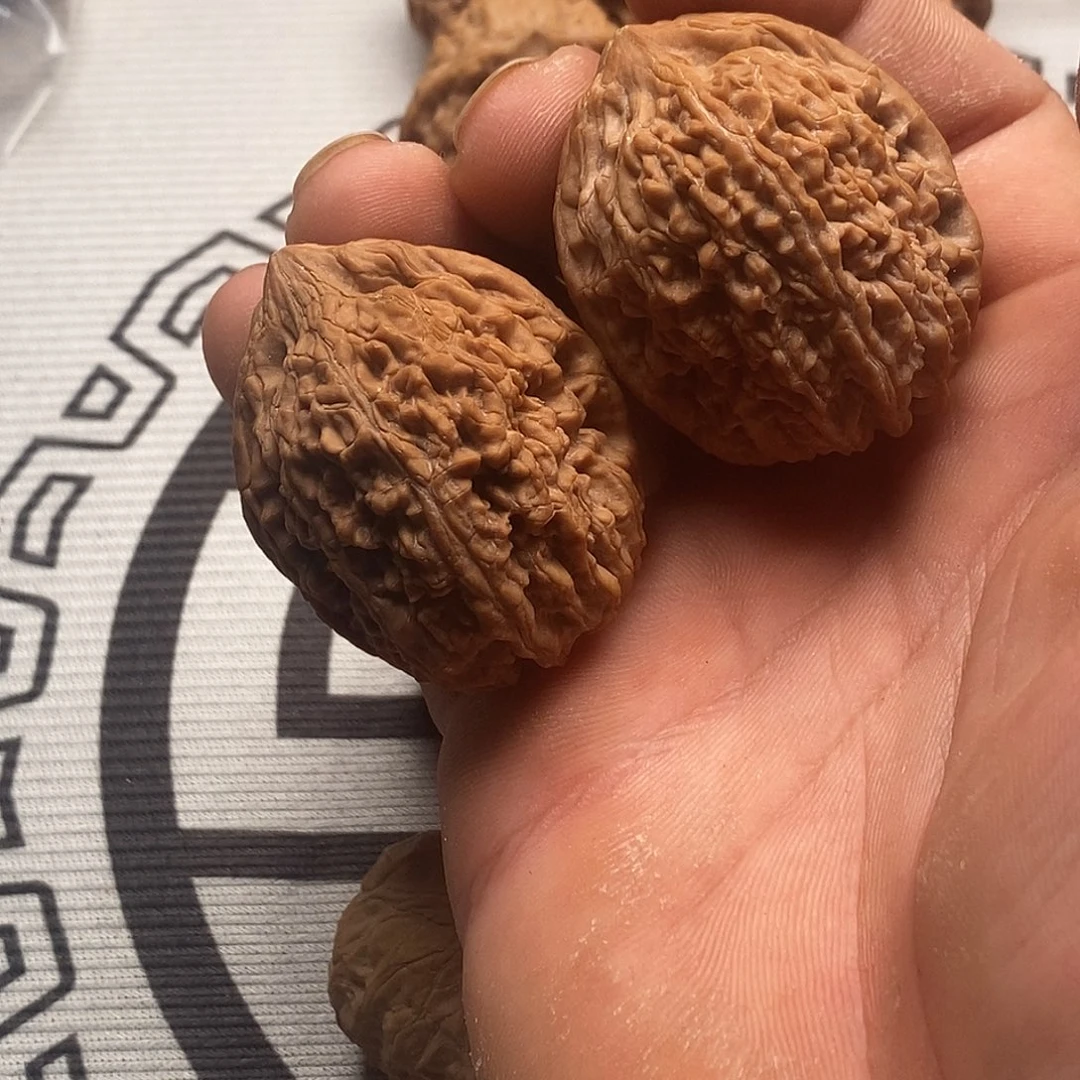 ****粉吊坠文玩核桃蒜头