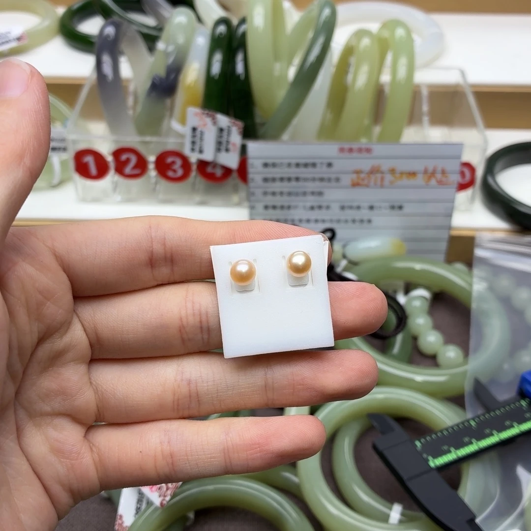 万***）和田玉未镶嵌手镯