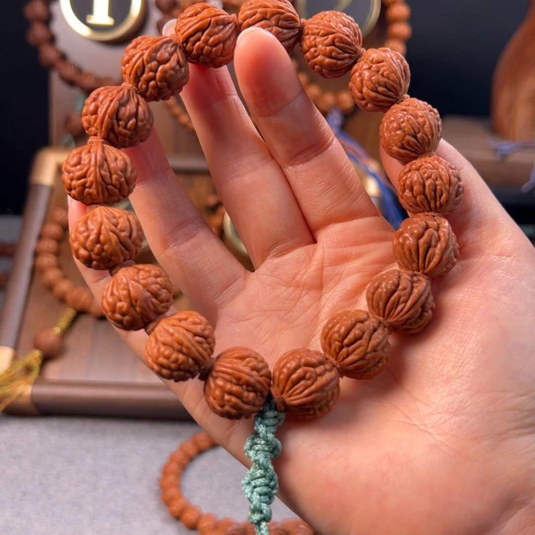 阿***谈桃核吊坠18野生荔枝