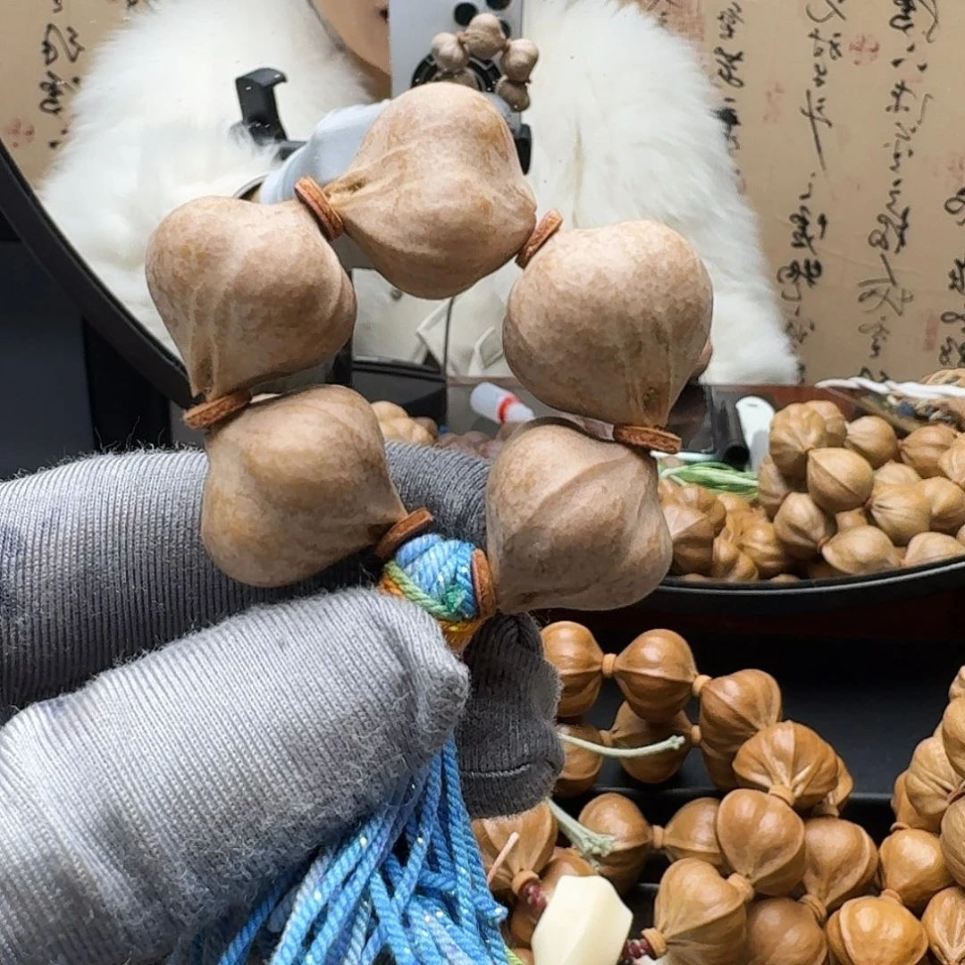 手串橄榄核三面佛蜜桃