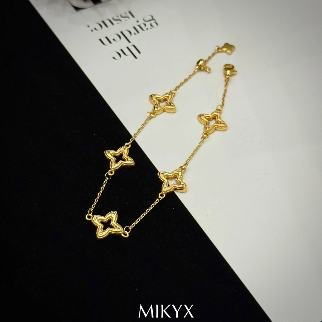 mikyx 铜合金合成锆石手链 金色不规则镂空手链B641