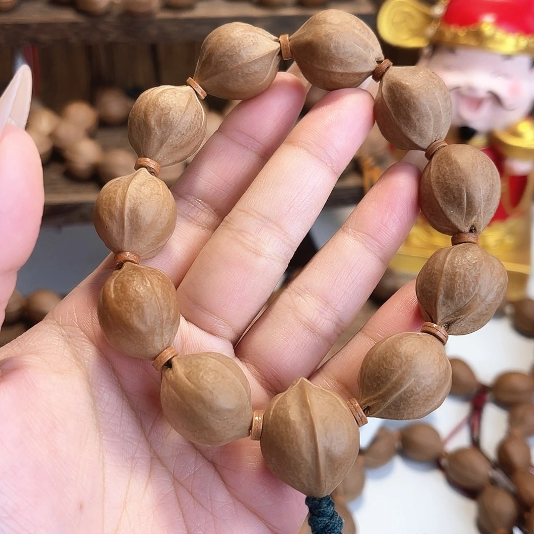 闲***鹤手串/手链橄榄核梅林