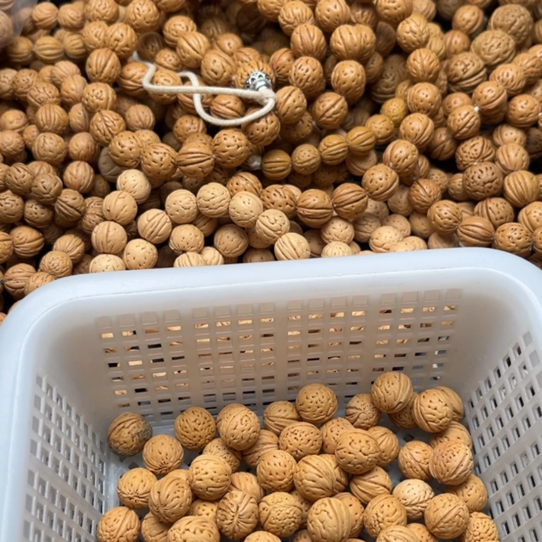 玉***米手串文玩核桃散籽批发50米