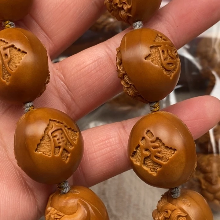 爱***冬橄榄核吊坠橄榄核