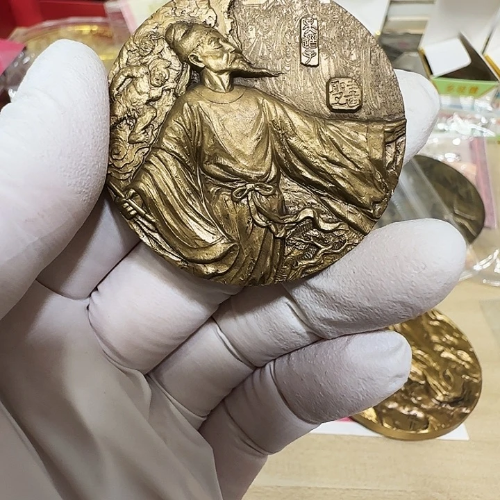 其他普通金属画圣铜章一个