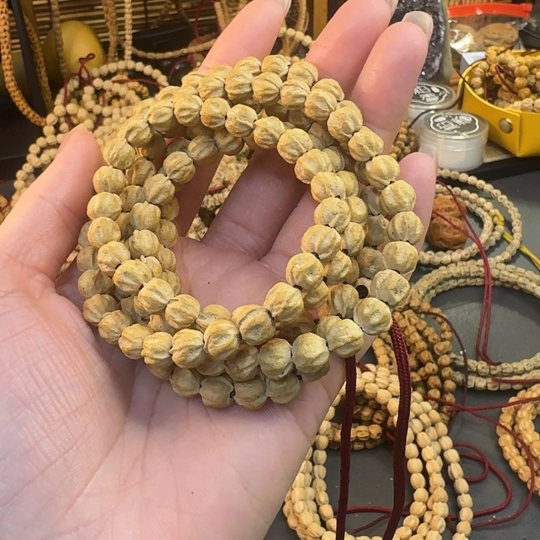 柏香籽/百香籽把件维*诘