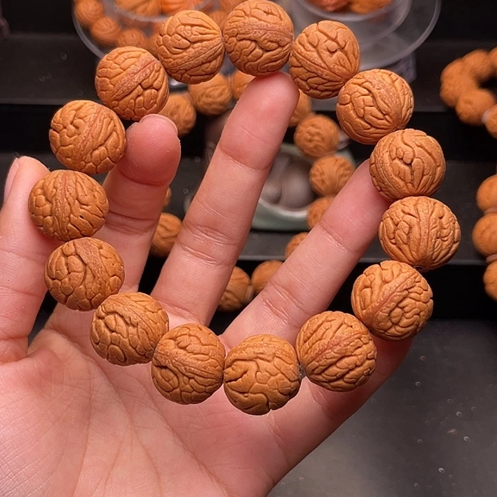 手串桃核金丝龙珠1.5