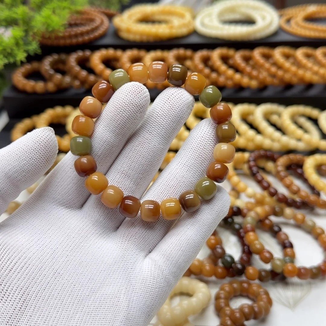 手串菩提根/象牙果10*11精工5年