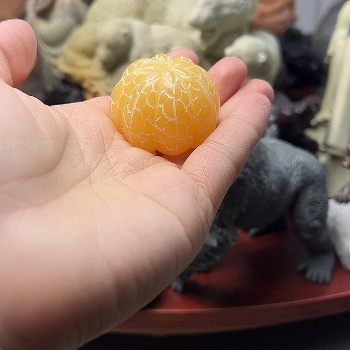 辽宁石橘子手把件