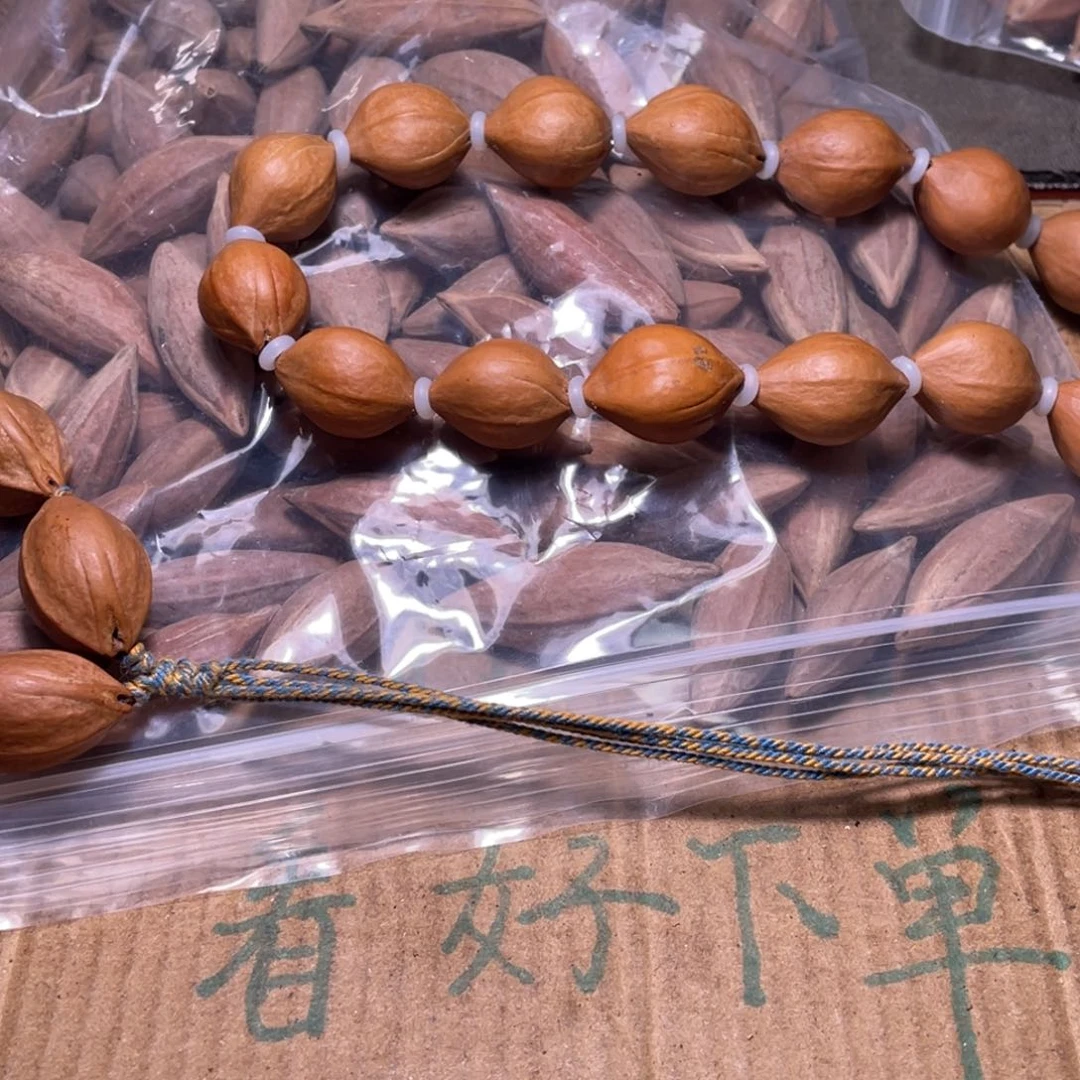 刘***忠橄榄核吊坠不退不换wwrtyui