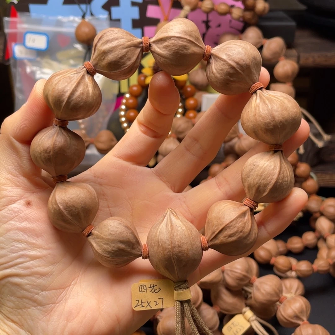 @***刚橄榄核吊坠2527四花铁核