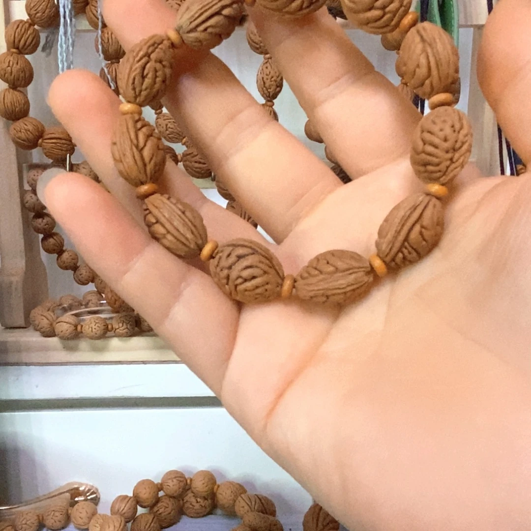 悠***得手串桃核111111111111