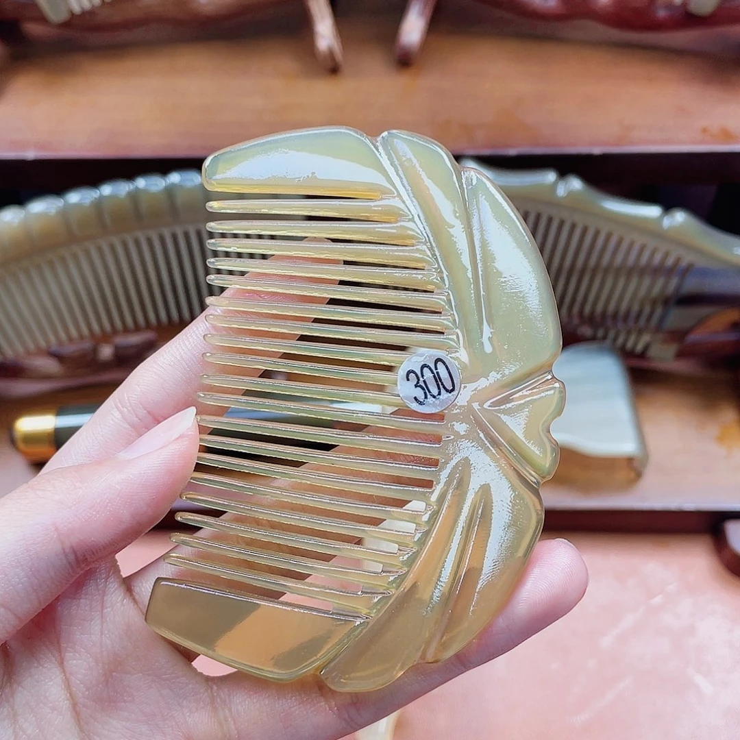 纯手工制作的牛角梳300