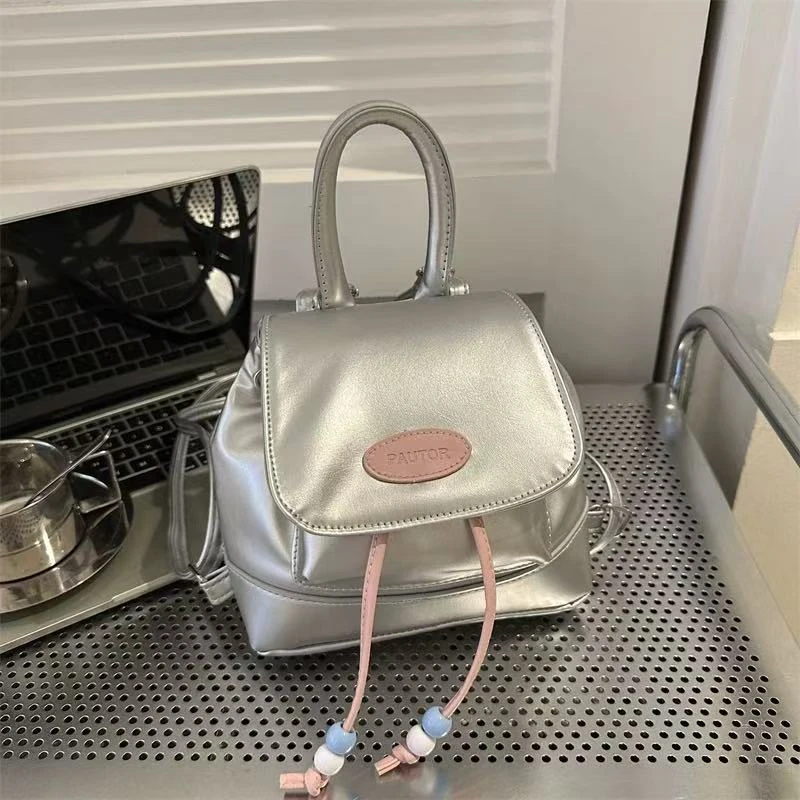 网红爆款包包韩版小众设计银粉撞色双肩包女2025新款水桶包ins