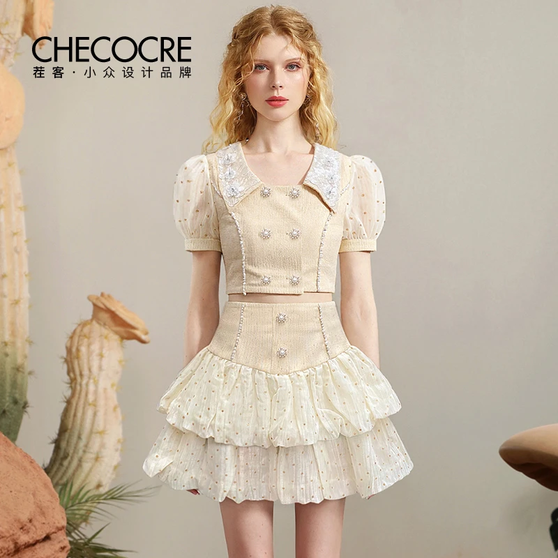 茬客甜美时尚泡泡袖套装裙夏新款珠片上衣两件套蛋糕裙CM710010AB