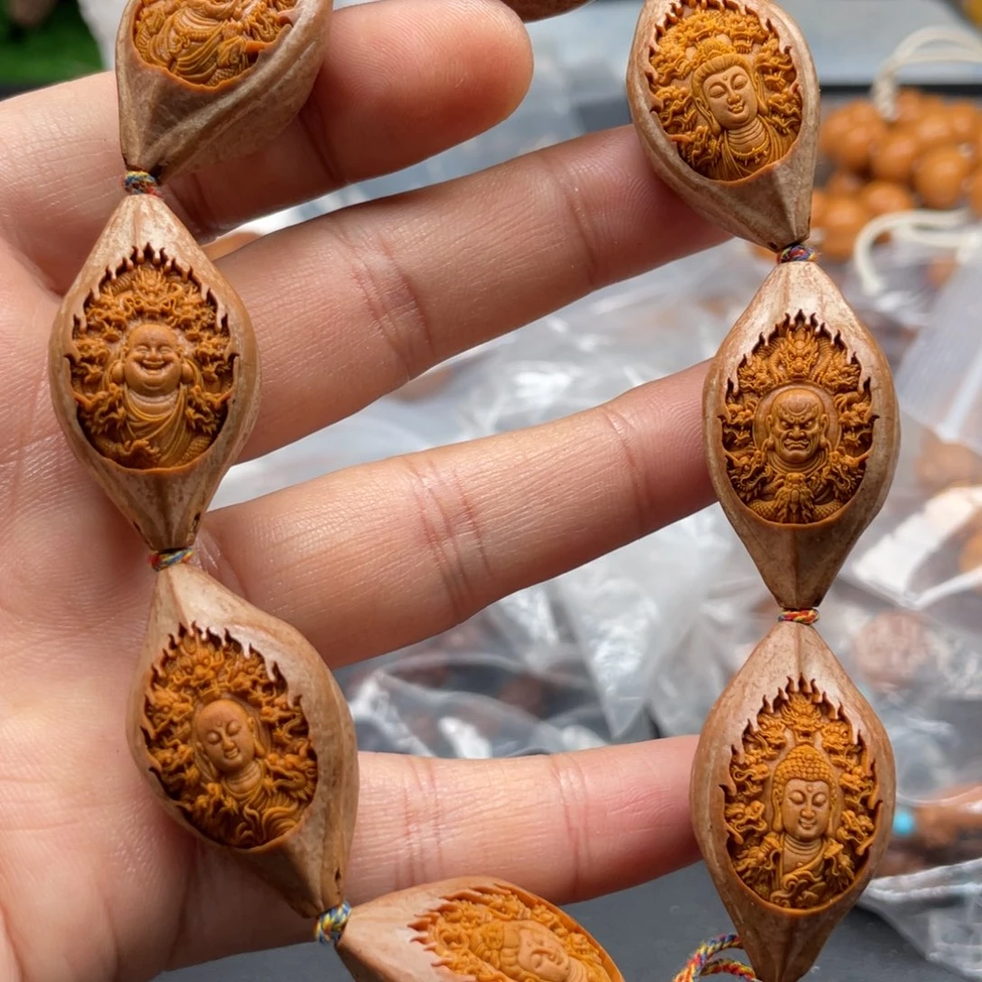 吊坠橄榄核嗯哼哈