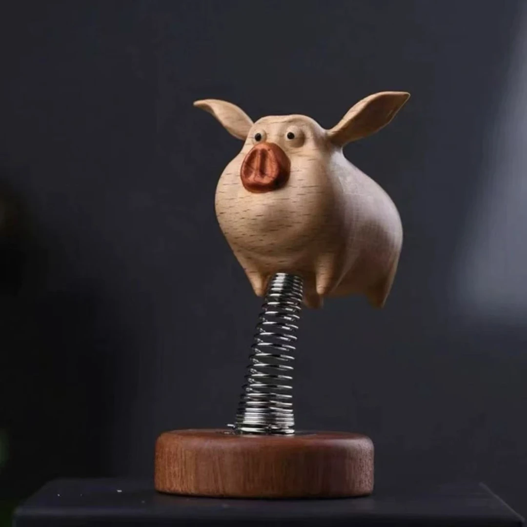 飞猪弹簧桌面摆件实木创意设计搞怪