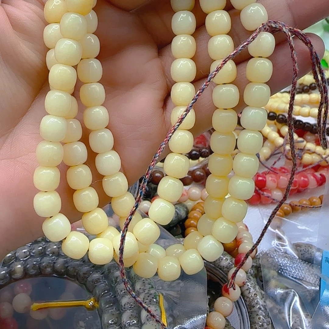 手串星月菩提185奶油黄坨坨87-108桶