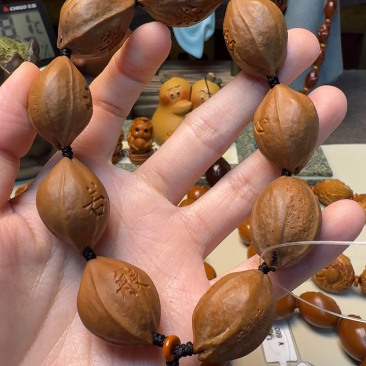 彬****橄榄核手串/手链心经