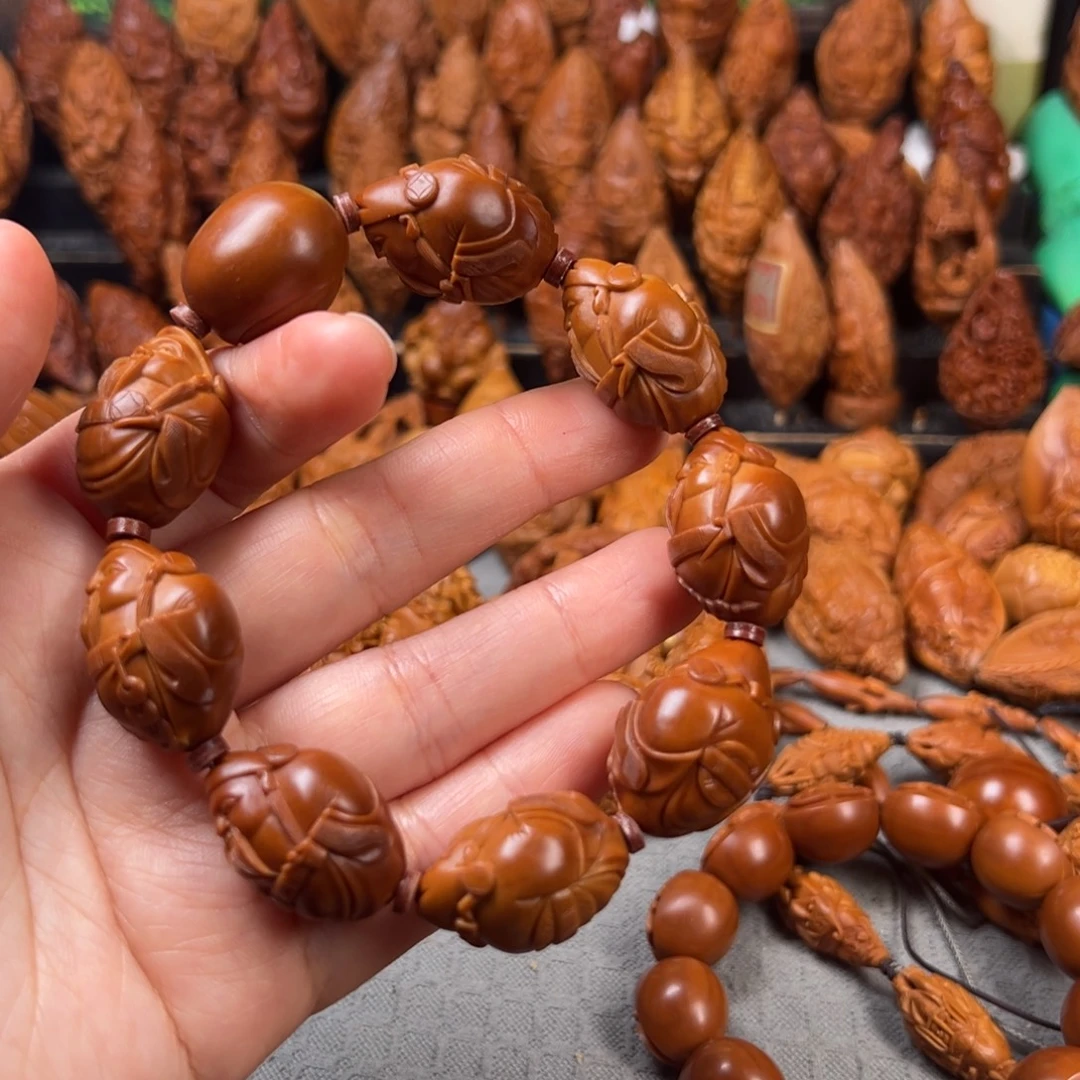贝***勒橄榄核手串/手链核雕