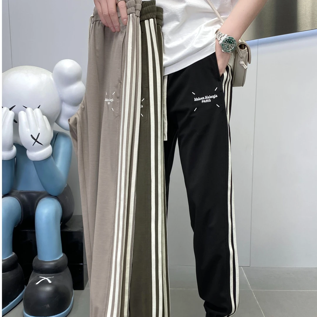 【唠叨哥】夏季新品时尚潮流精工刺绣织带搭配弹力松紧口休闲裤8707