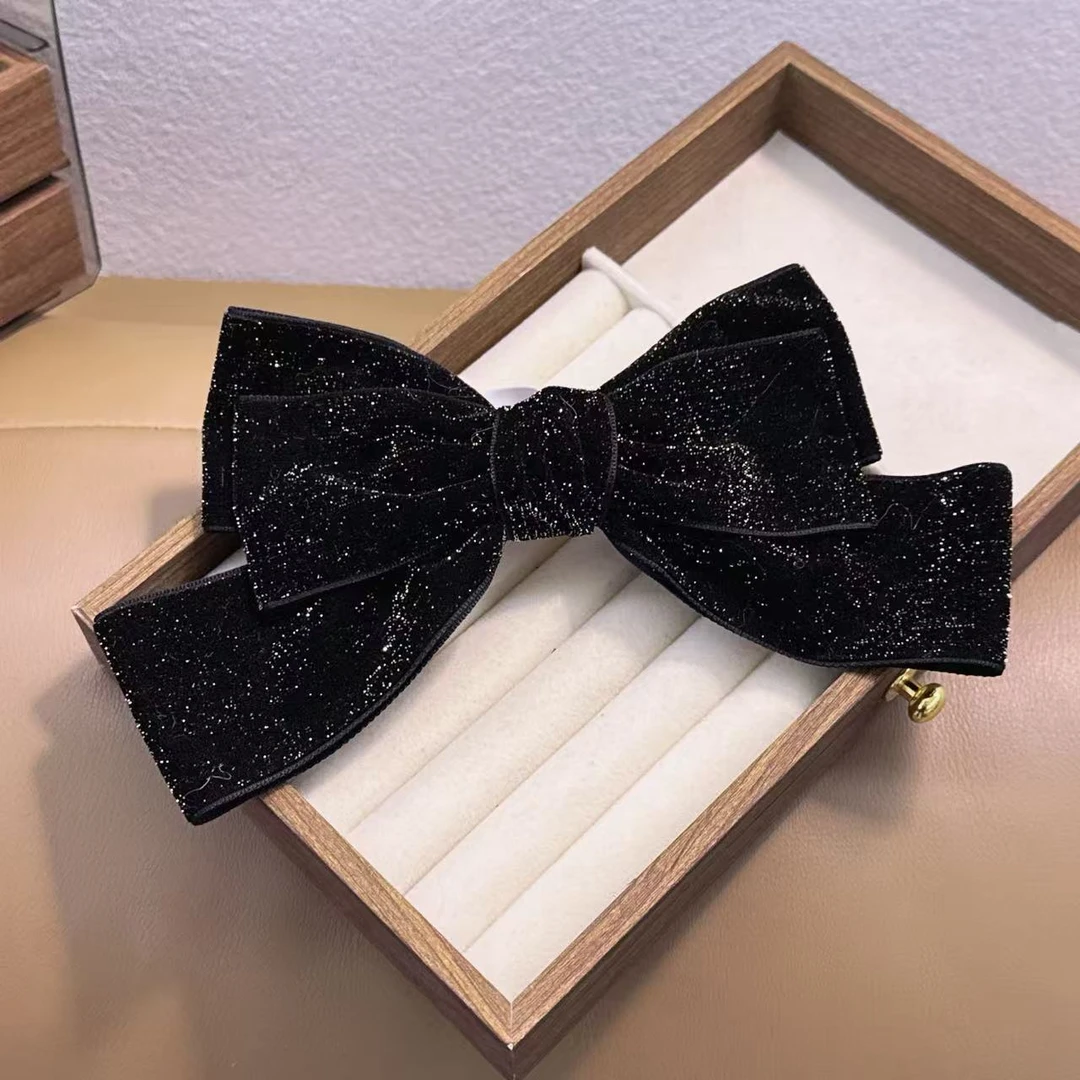 韩系新款精致黑色细闪丝绒蝴蝶结时尚百搭十公分弹夹WM-1060