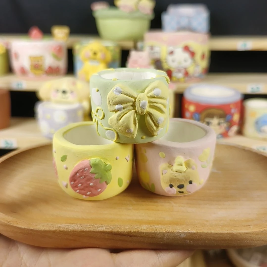 এ***妮草莓蝴蝶结拇指盆组合