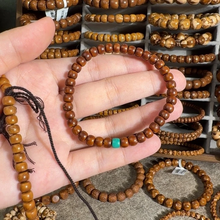 紫金鼠手串5.7*4.5咖黄皮肉珠