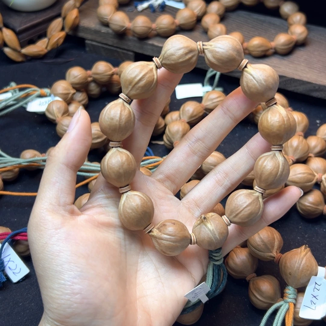 手串橄榄核不**此19