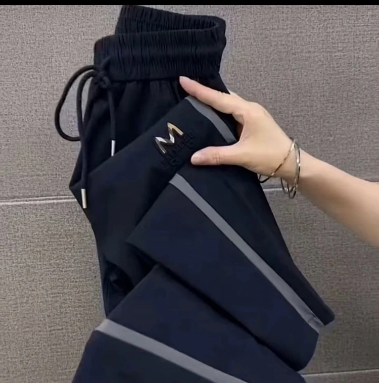 时尚百搭侧灰条小脚女裤