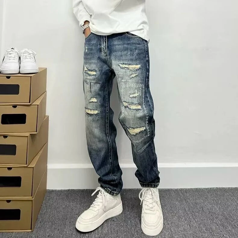 美式破洞牛仔裤男补丁刺绣潮流个性百搭秋季高街锥形新款蓝色长裤