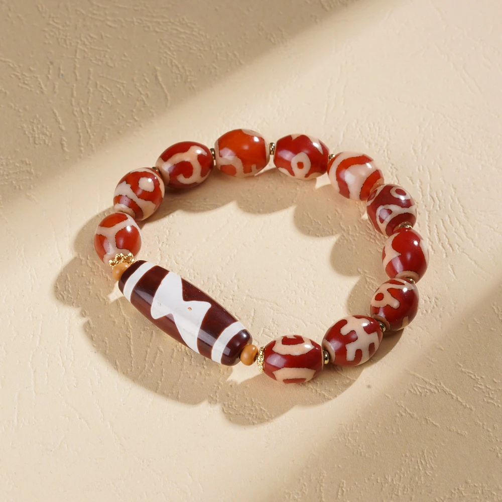 云丹拉姆丨红肉五眼闪多宝天珠手串多样性发其一