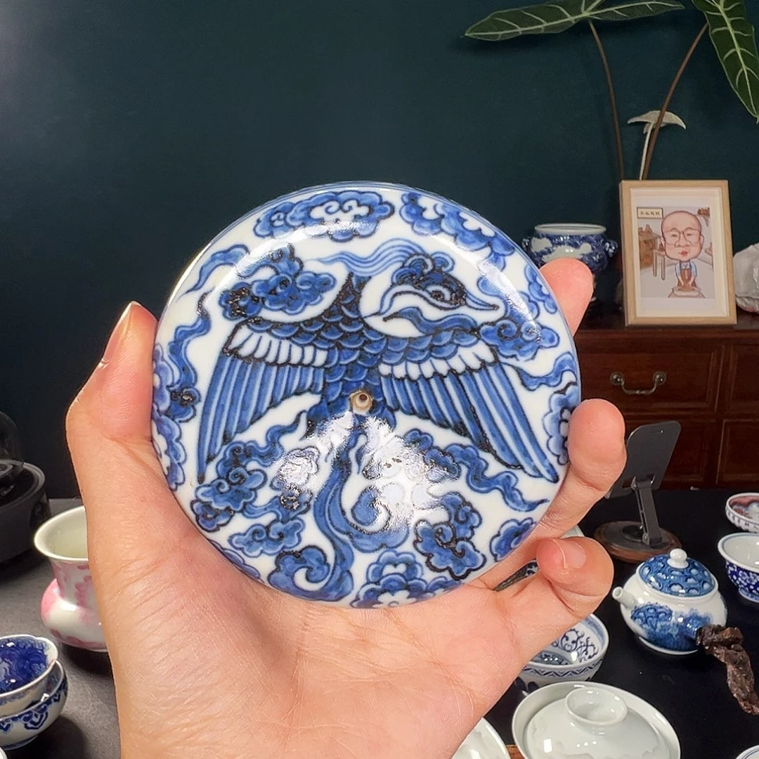 手工盖置凤纹。